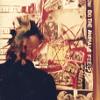 Gillian Farrow looking at punk art, 1984 - Source: Les Futo